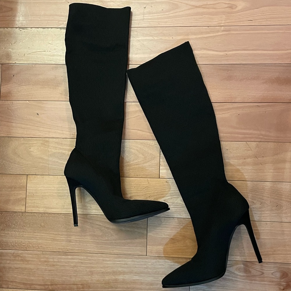 Knee high heeled boots